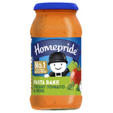 Homepride Pasta Bake Creamy Tomato & Herb 450g comes in a jar with a blue lid and label featuring a cartoon character and tomatoes—ideal for making a tasty creamy tomato pasta bake.